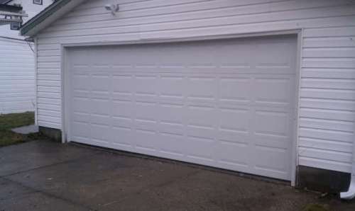Image of 9100 Colonial Style New Garage Door Installed in Euclid Ohio, Near Cleveland.