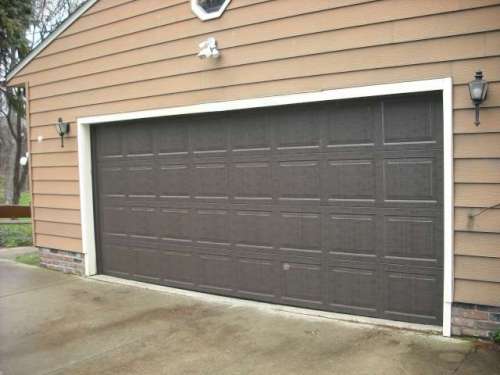 Image of 9600 Colonial Style New Garage Door Installed in Lake County Ohio.