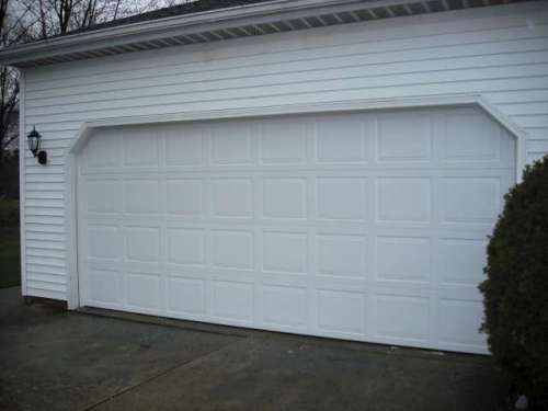 Image of 9100 Colonial Style New Garage Door Installed in Richmond Heights Ohio, Near Cleveland.