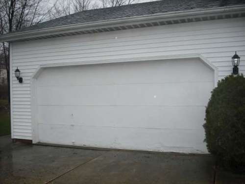 Image of 9100 Colonial Style Old Garage Door Installed in Richmond Heights Ohio, Near Cleveland.